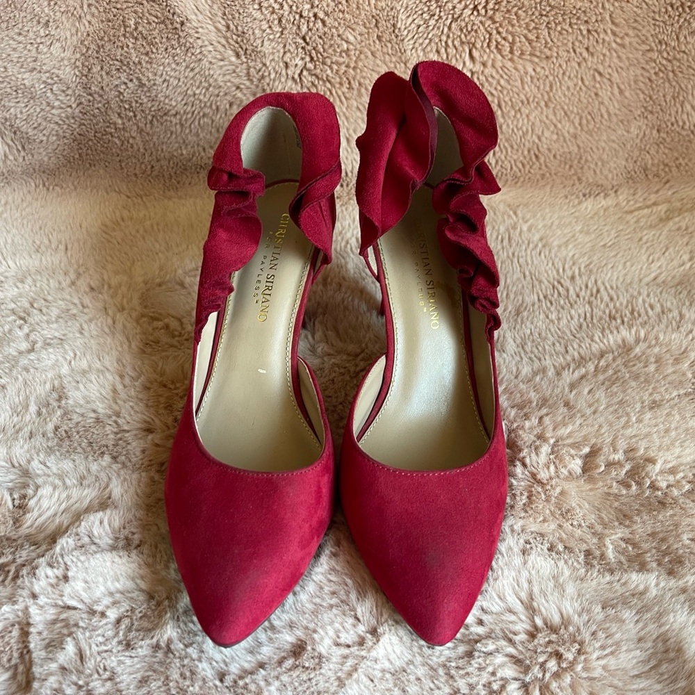 Red ruffles high heels.